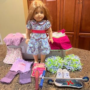 American Girl doll - Emily with extra outfits and accessories. EUC.
